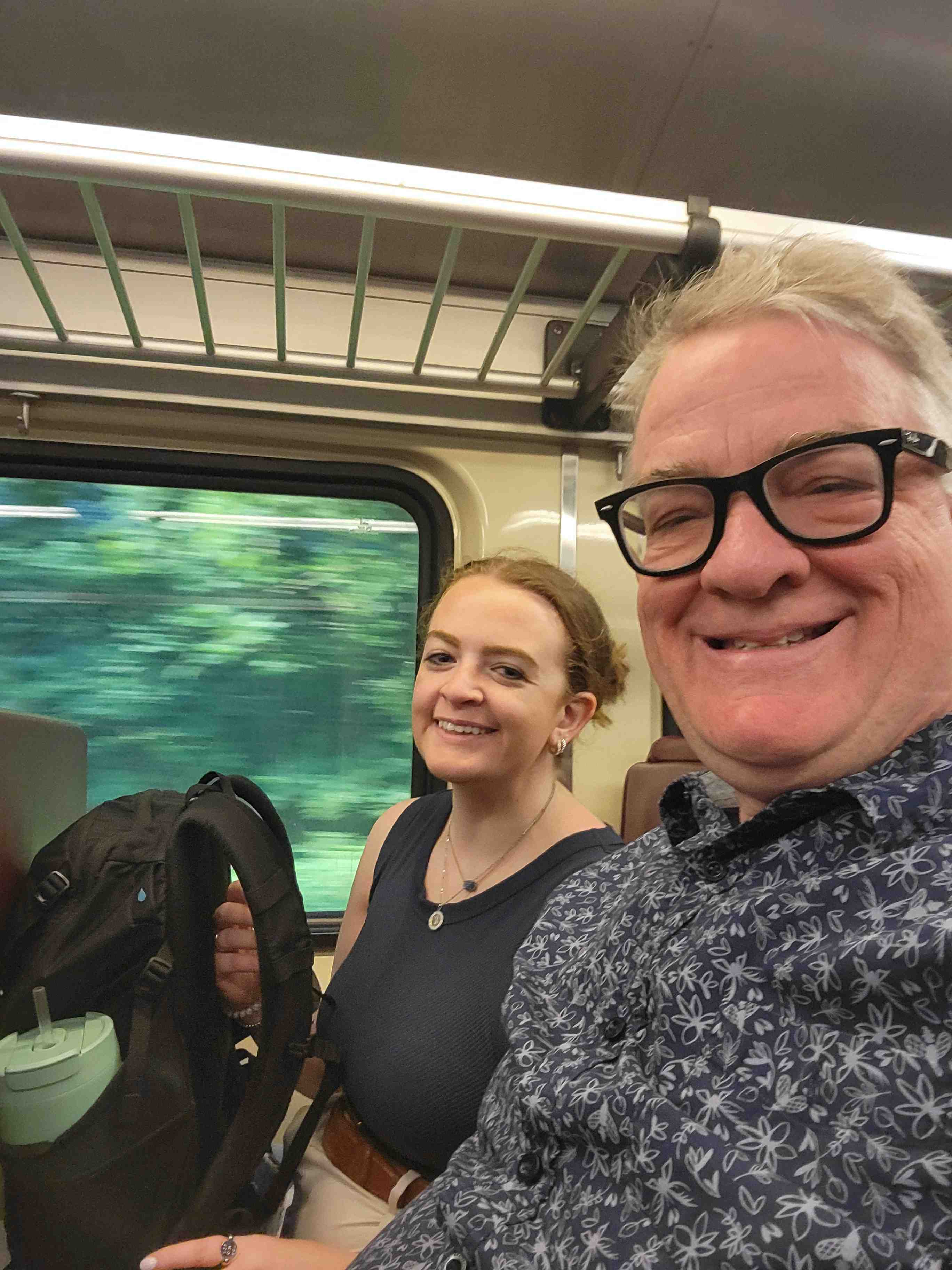 2025-07-24 RnJ ridding the commuter rail.jpg